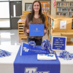 Neff scholarship recipient at signing