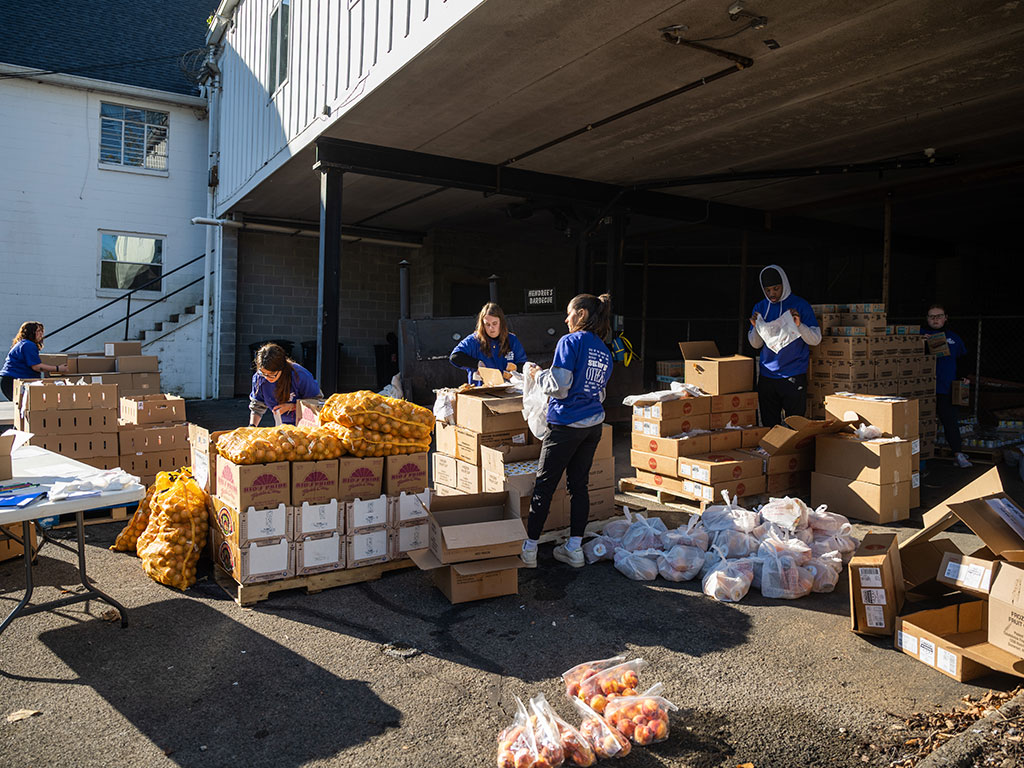 TWU students serving others