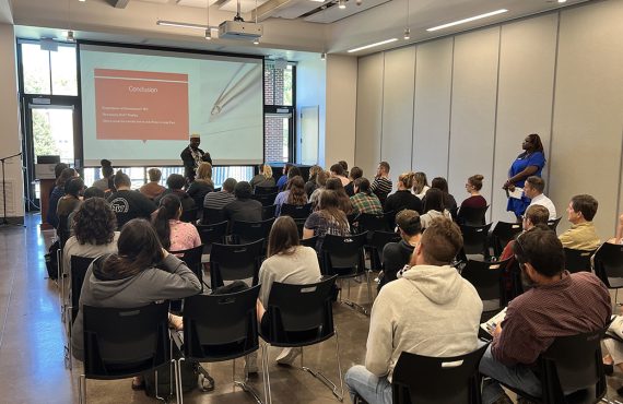 Dr. Bocco teaching at a convocation