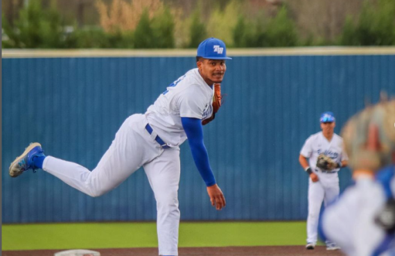 TWU student athlete pitching a baseball