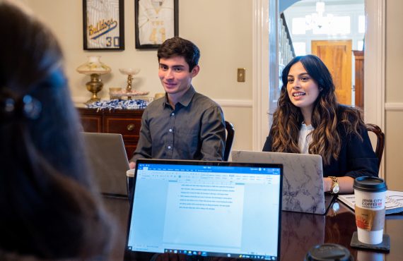 Two students meeting in Blakeslee Hall