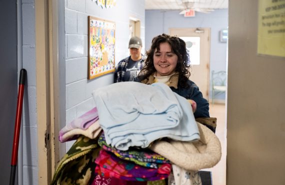 Student donating during day of service