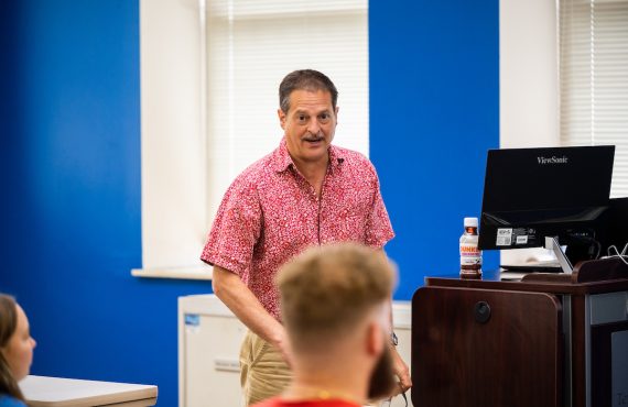 professor lecturing in Durham language building