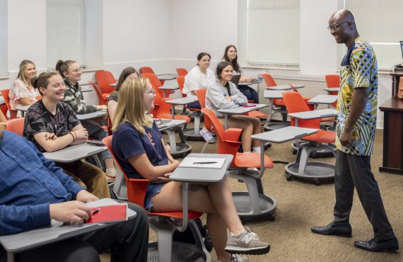 dr. bocco lecturing in durham hall